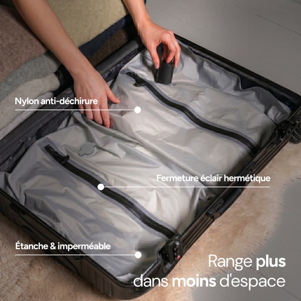 Sac sous vide rangé dans une valise cabine